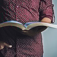 Man Holding Bible